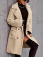 Eilly Bazar Autumn and winter faux fur coat with pockets for warmth.